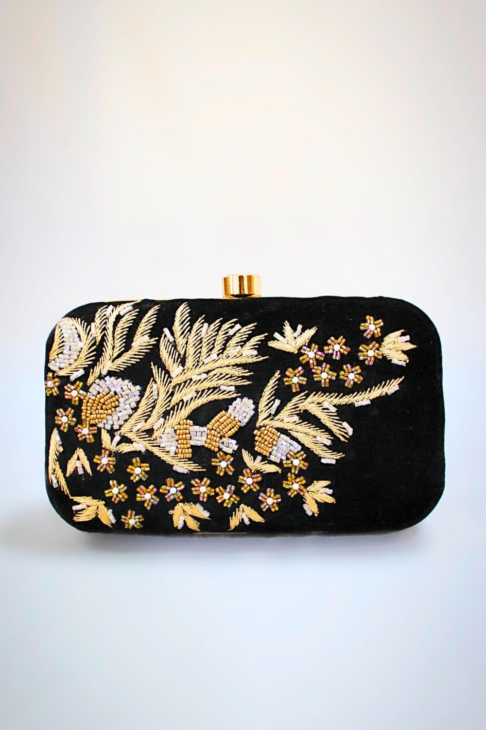 black and gold clutch