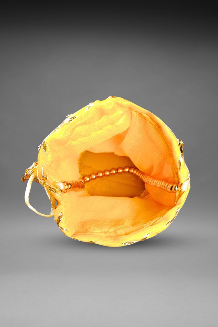 yellow mirror work potli bag