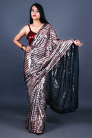 Stunning Queen Sequinned Net Saree